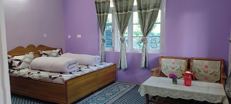 Desk, laptop workspace, blackout drapes, soundproofing