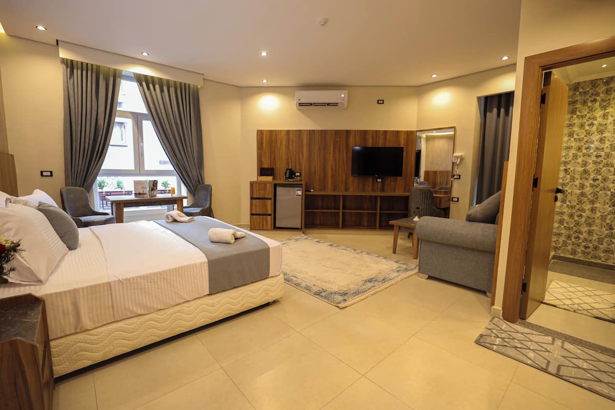 Habitación doble Deluxe | Escritorio y wifi gratis