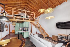 Living area - A mountain chalet with breathtaking views by Lavibes, located in São Vicente (Sao Vicente)
