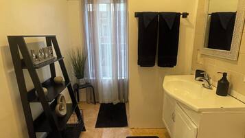 Shower, towels, toilet paper