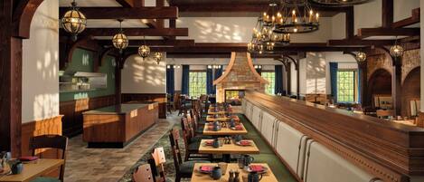 A restaurant with wooden beams, a stone fireplace, and multiple tables with chairs.