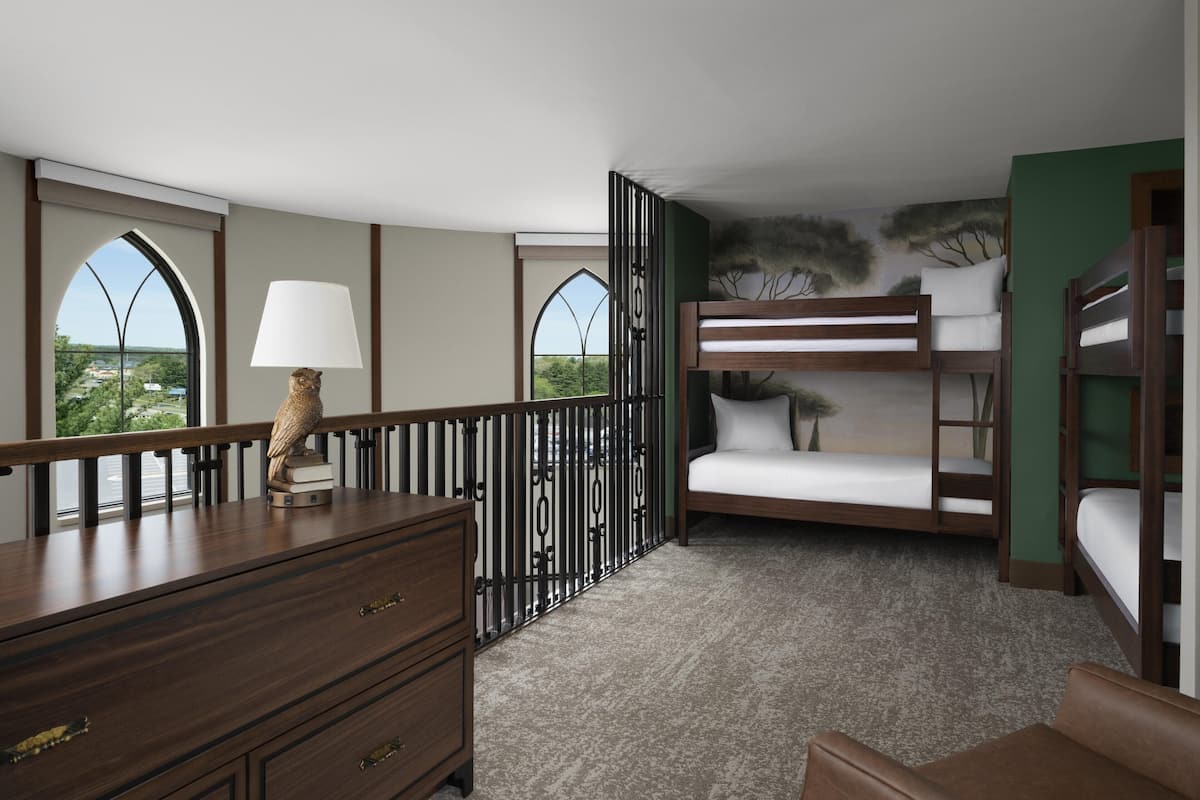 Queen's Quarters | In-room safe, desk, blackout curtains, iron/ironing board
