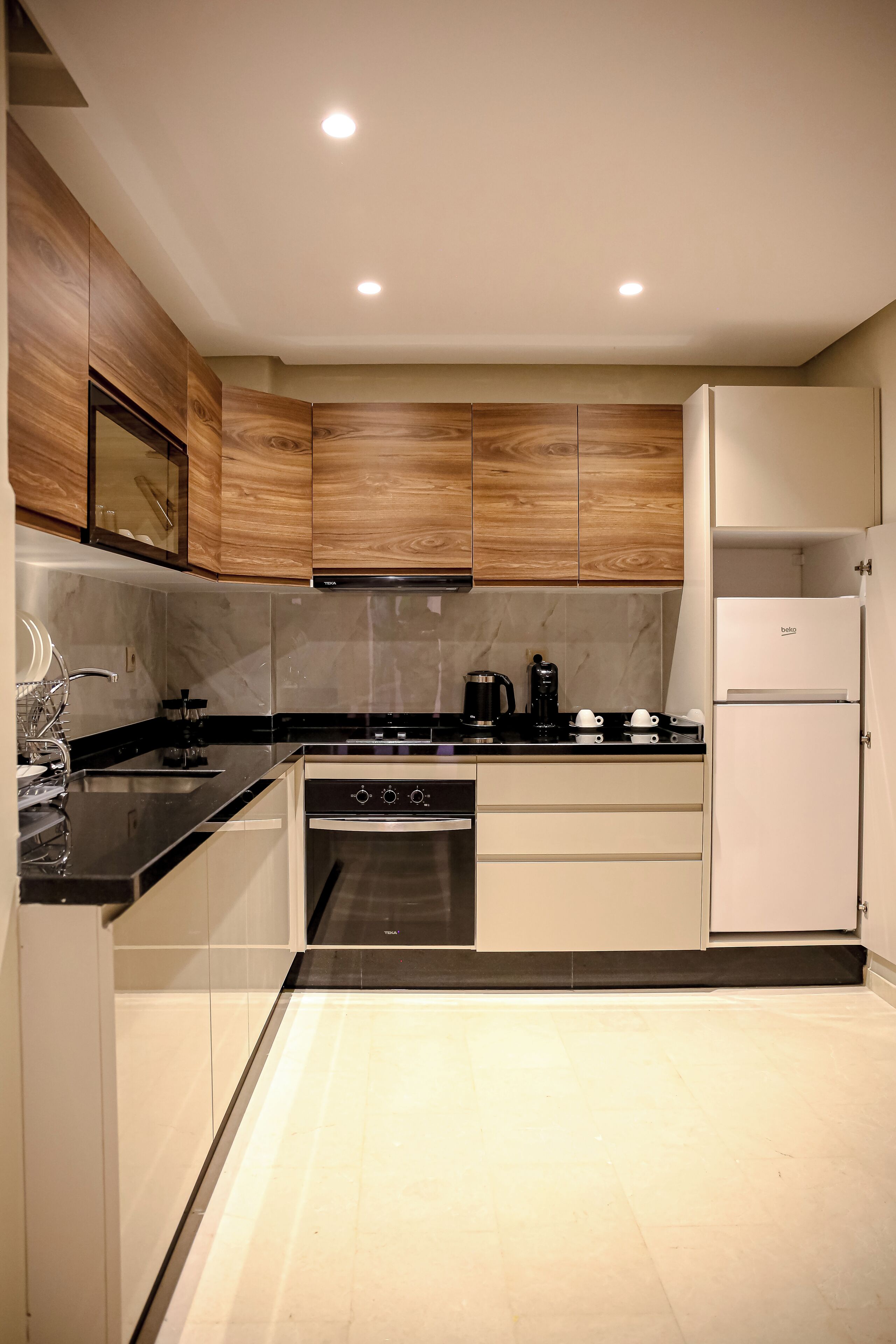 Appartement Deluxe | Cuisine privée | Mini réfrigérateur, moulin à café