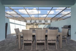 Outdoor dining - Ideal Family 5BR Villa in Windsor at Westside Resort ● Private Pool, BBQ & more! (Kissimmee)