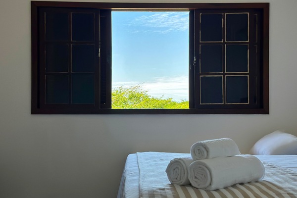 Habitación cuádruple familiar, varias camas, aire acondicionado, vista al jardín | Minibar, espacio para trabajar con laptop y wifi gratis