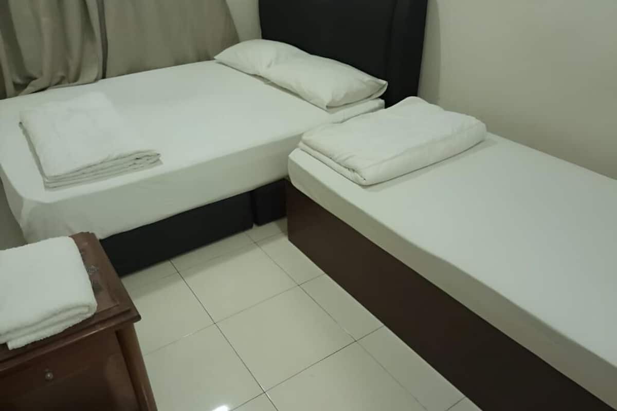 Classic Quadruple Room, City View | Iron/ironing board, free WiFi