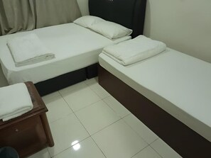 Classic Quadruple Room, City View | Iron/ironing board, free WiFi