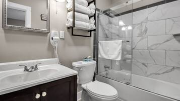 Hair dryer, towels, soap, toilet paper