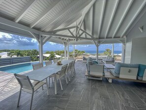 Outdoor dining - Villa with pool & sea view for 12 (Sainte-Anne)
