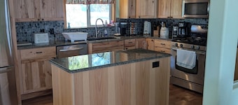 Short walk to the Beach! Beautiful Remodeled 4BR Home with large deck.