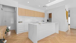Fridge, microwave, oven, stovetop - Luxe 4BR Retreat with Heated Pool & Finnish Sauna, Steps to the Beach (Culburra Beach)