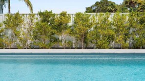 A heated pool - Luxe 4BR Retreat with Heated Pool & Finnish Sauna, Steps to the Beach (Culburra Beach)
