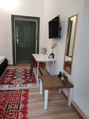 Room, City View | In-room safe, desk, laptop workspace, blackout drapes