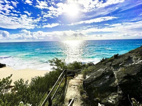 Private pool and private beach in this wonderful Warwick beachfront apartment