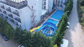 Seasonal outdoor pool, pool umbrellas, sun loungers