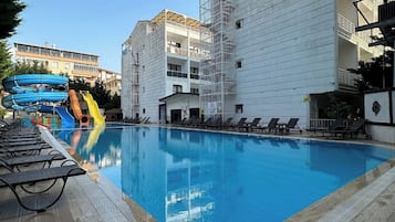 Seasonal outdoor pool, pool umbrellas, sun loungers