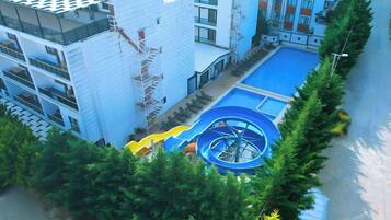 Seasonal outdoor pool, pool umbrellas, sun loungers