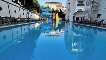 Seasonal outdoor pool, pool umbrellas, sun loungers