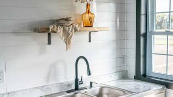 Microwave, stovetop, coffee/tea maker, toaster