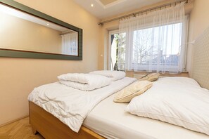 1 غرفة نوم ومكواة/لوح كي وملاءات أسرّة