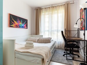 1 غرفة نوم ومكواة/لوح كي وواي فاي وملاءات أسرّة