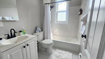 Hair dryer, towels, soap, toilet paper
