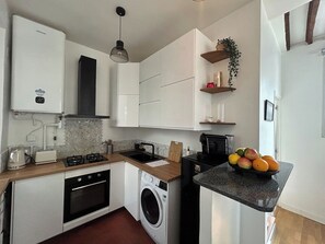 Coffee/tea maker, fridge, microwave, oven - BnBNook - 3BR - République and Centre Pompidou (Paris)
