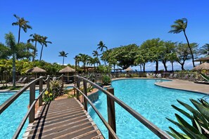 Cross the tropical bridge to resort pools framed by palms, cabanas & crystal-clear waters - Maui Kaanapali | Penthouse 2 BR | Car Incl. w/ 6+ Nights | MKV-A606 by KBM (Lahaina)