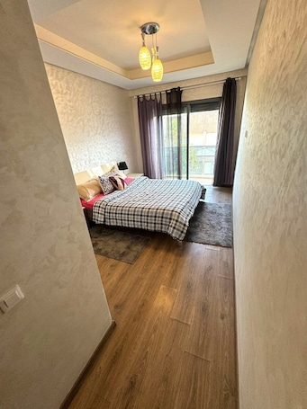 2 bedrooms, WiFi, bed sheets. Welcoming To Our Quite building Multi Apartments
