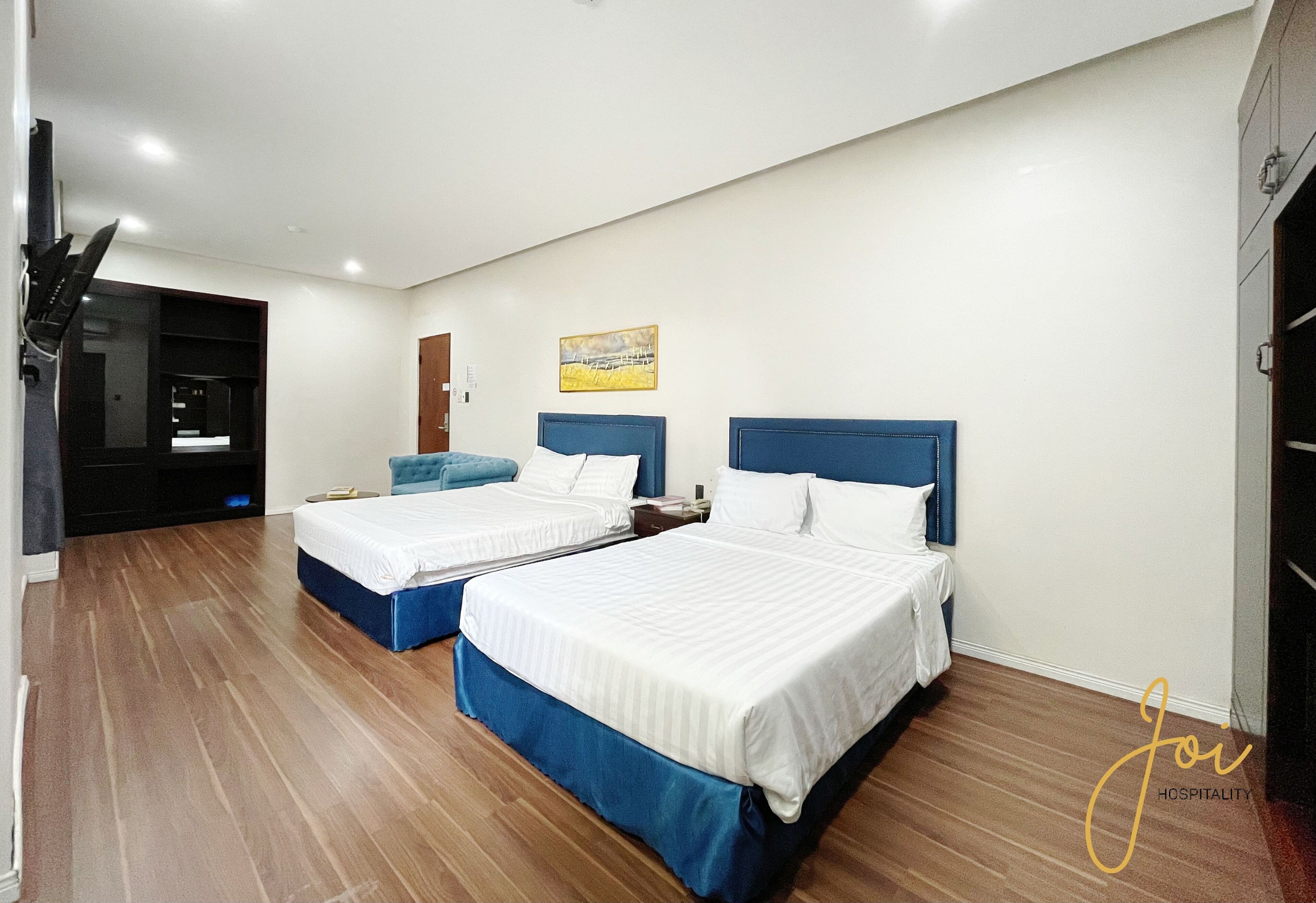 Family Double Room, 2 Queen Beds | Desk, laptop workspace, blackout curtains, iron/ironing board