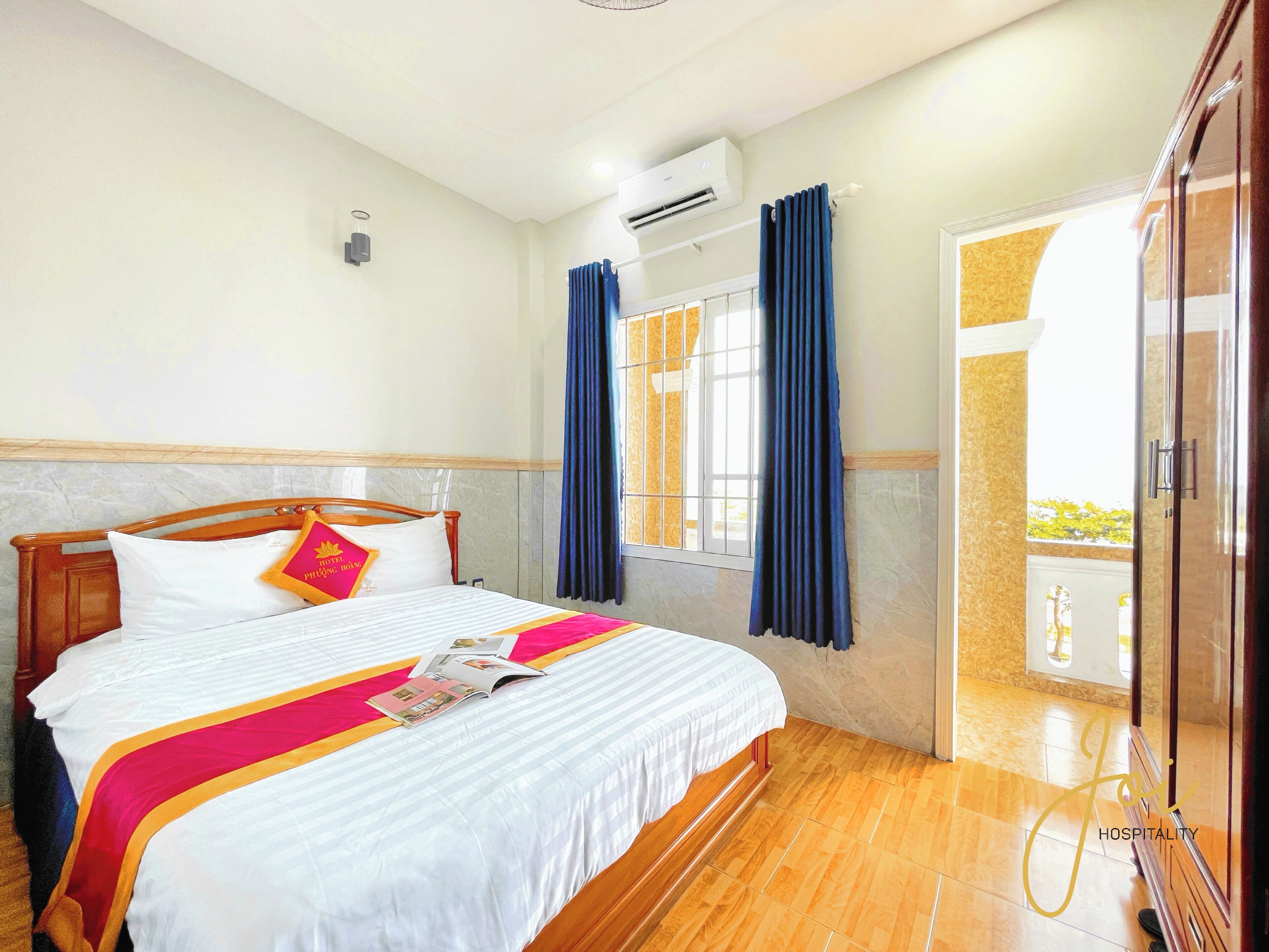 Deluxe Double Room, Balcony, Beach View | Desk, laptop workspace, blackout drapes, iron/ironing board