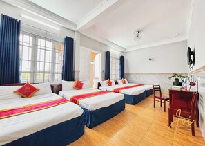 Family Quadruple Room, Balcony, Beach View | Desk, laptop workspace, blackout curtains, iron/ironing board - Phuong Hoang Hotel  (Vung Tau Ward)