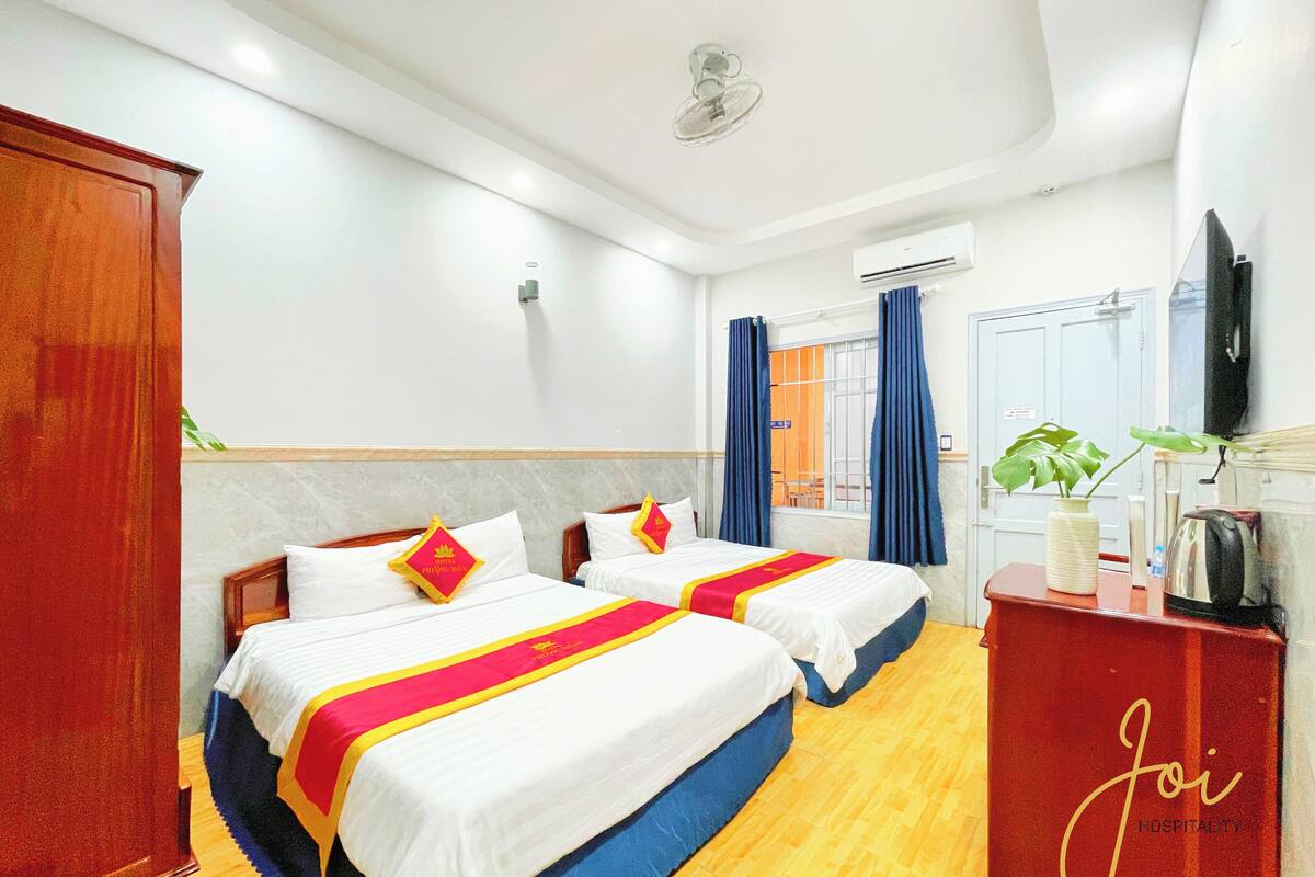 Family Double Room, 2 Queen Beds | Desk, laptop workspace, blackout drapes, iron/ironing board