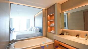 Jetted bath, hair dryer, bidet, towels