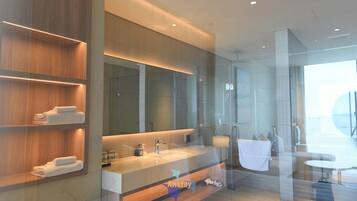 Jetted bath, hair dryer, bidet, towels