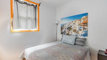 2 habitaciones, tabla de planchar con plancha y acceso a internet