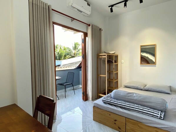 Habitación Deluxe, balcón, vista al jardín | Balcón