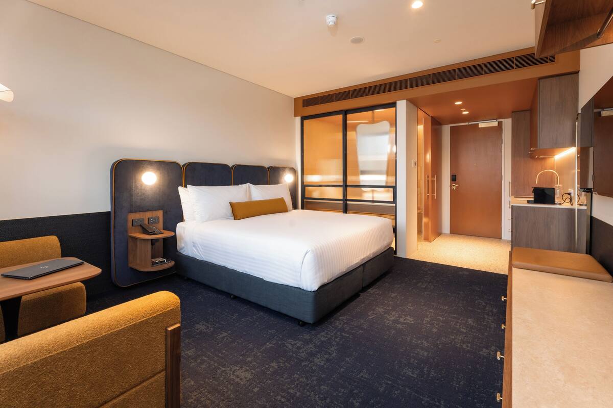 Premium bedding, down comforters, pillowtop beds, in-room safe