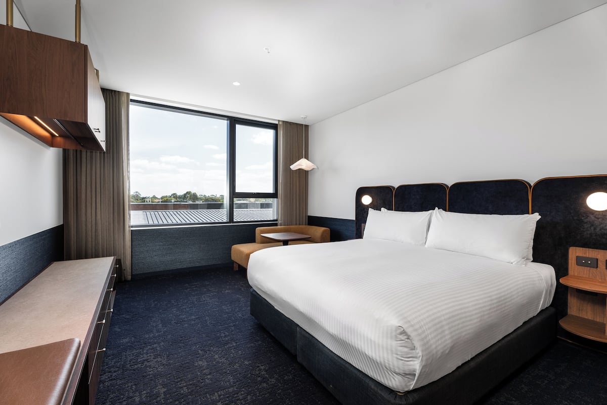 Luxe beddengoed, pillowtop-bedden, een kluis op de kamer