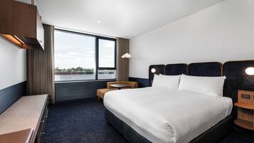 Premium bedding, pillow-top beds, in-room safe, laptop workspace