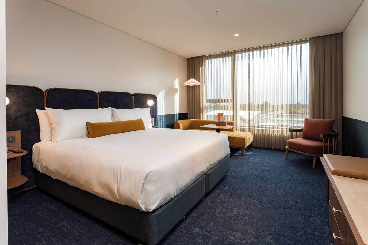 Premium bedding, down comforters, pillowtop beds, in-room safe