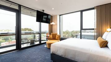Premium bedding, pillow-top beds, in-room safe, laptop workspace
