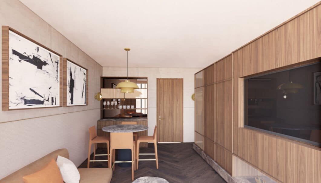 A modern kitchen with wooden cabinetry, a dining area with a round table and chairs, and a large window.
