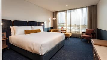 Classic King | Premium bedding, down duvets, pillow-top beds, in-room safe