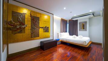 Condo, 4 Bedrooms, Non Smoking, Garden View | In-room safe, blackout curtains, iron/ironing board, free WiFi