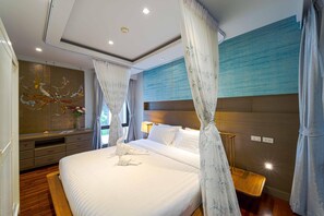 Apartamento, 4 habitaciones, no fumadores, vistas al jardín | Caja fuerte, cortinas opacas, tabla de planchar con plancha