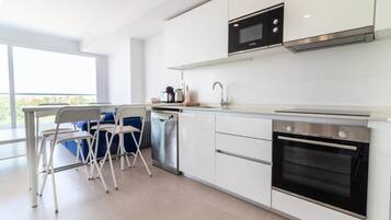 Fridge, microwave, oven, coffee/tea maker