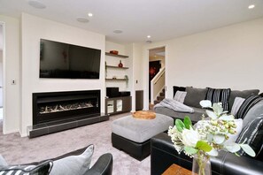 TV, fireplace, offices - Spacious Family & Group Retreat - Wigram Residence (Christchurch)