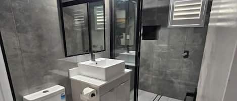 Shower, free toiletries, towels, soap