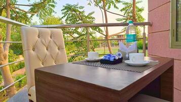 Deluxe Double Room, Garden View | Balcony
